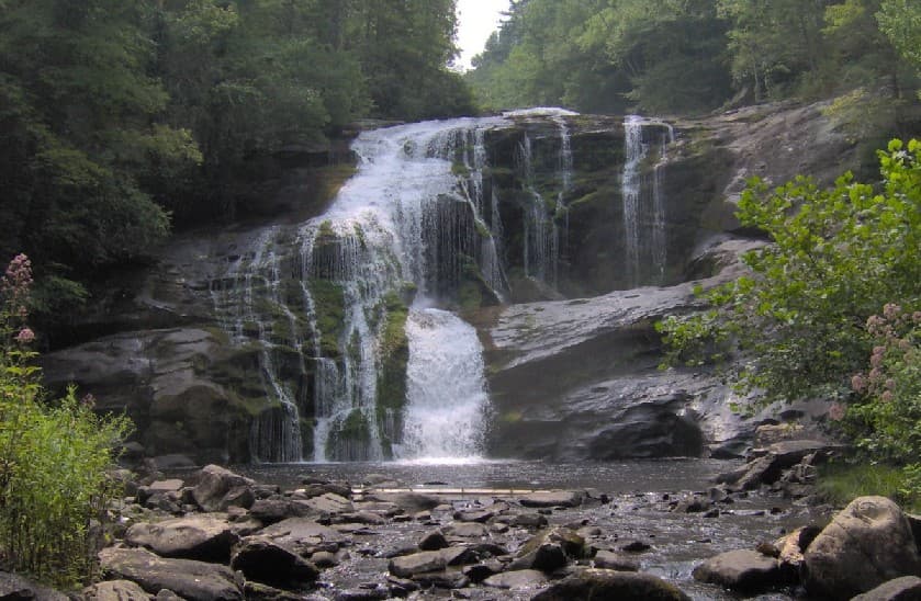 Bald River Falls cascading about 90 feet over tiered rock into the Tellico River