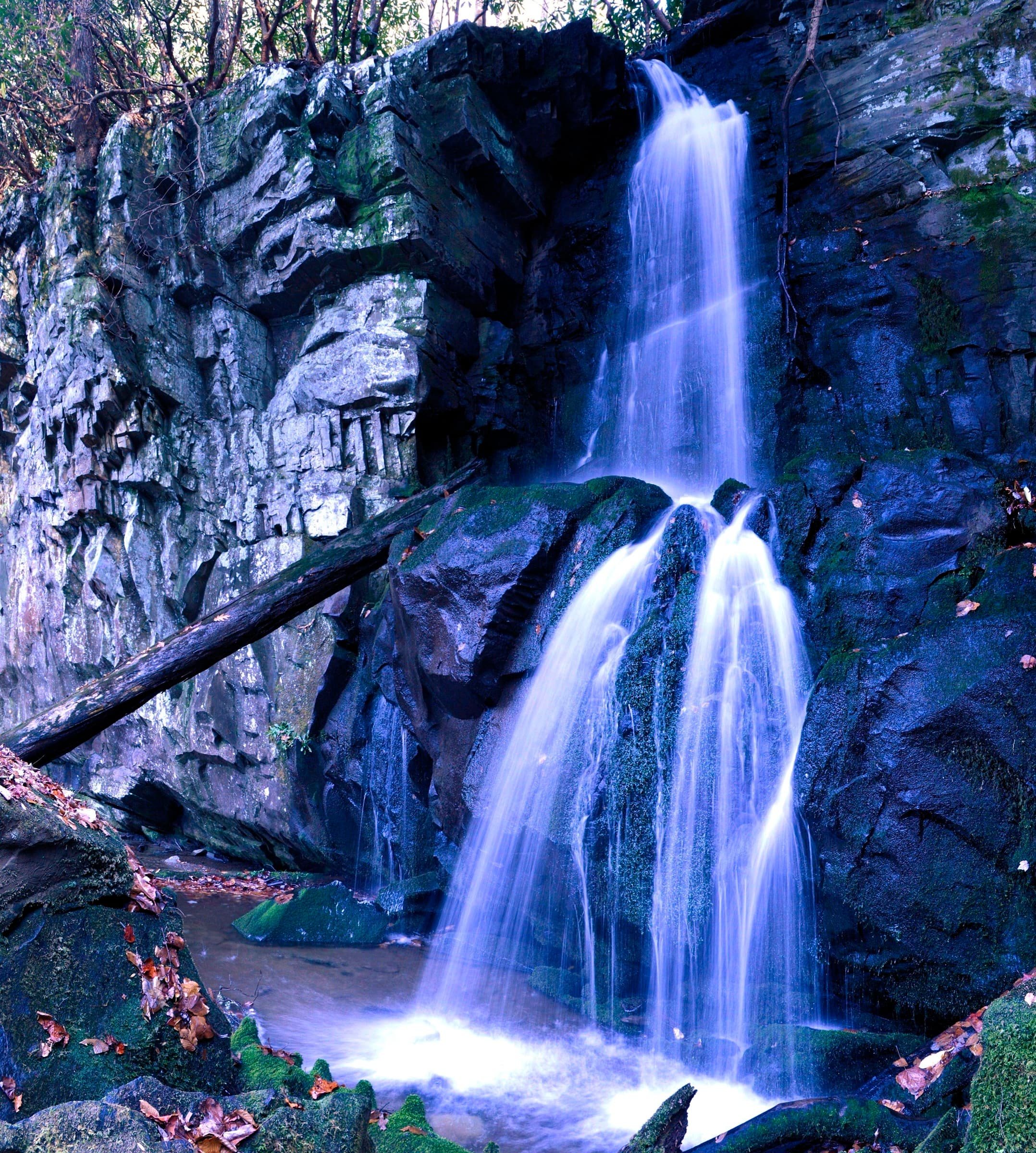 The two-tiered Baskins Creek Falls dropping about 40 feet in the Roaring Fork area of the Smokies